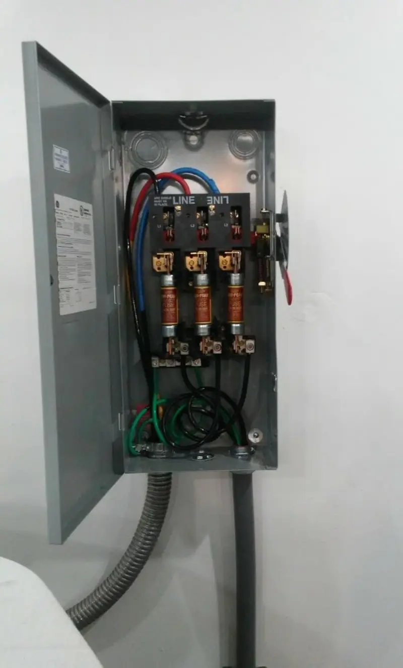 Three-phase disconnect switch installed for Smoke Detector Installation in Siesta Key